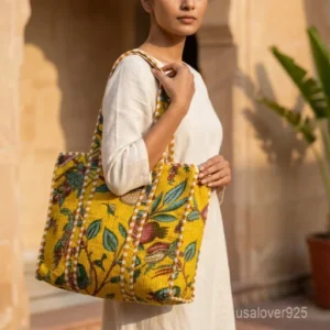 Safari Quilted Cotton Tote Bag with large shoulder handles showing the mustard yellow and green jungle print artisan design.
