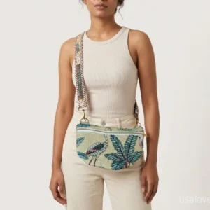 Beige Jungle Print Quilted Mini Purse with an adjustable crossbody strap showing the tropical botanical pattern.