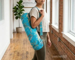 Blue Animal Print Quilted Cotton Yoga Mat Bag with an adjustable shoulder strap showing the vibrant leopard motif.