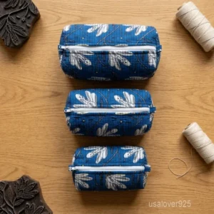 Set of 3 Blue Block Print Quilted Cotton Toiletry Bags nesting set showing the traditional indigo design and secure zipper lines with accent beads and tassels.