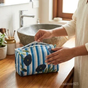Set of 3 Blue Floral Quilted Cotton Toiletry Bags nesting set showing the traditional indigo artisan design and secure zipper fastenings.