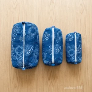 Set of 3 Blue Floral Quilted Cotton Toiletry Bags nesting set showing the traditional indigo artisan design and secure zipper fastenings.