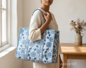 Blue Floral Quilted Cotton Tote Bag with shoulder straps showing the vibrant botanical hand block print design.