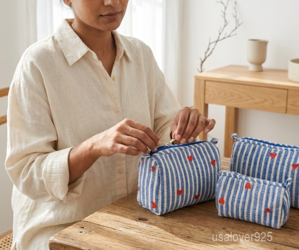 Set of 3 Blue Heart Makeup Pouch Set nesting configuration showing the traditional handcrafted striped design with red hearts and smooth zipper closures.