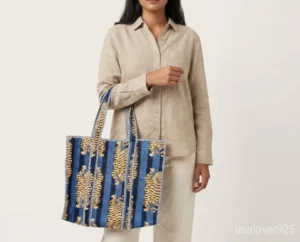 Tiger Print Quilted Cotton Tote Bag with long over-the-shoulder handles featuring an authentic tiger block print pattern.