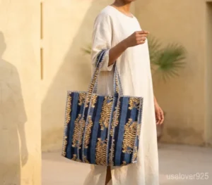 Tiger Print Quilted Cotton Tote Bag with long over-the-shoulder handles featuring an authentic tiger block print pattern.