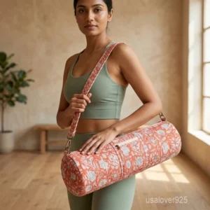 Coral Floral Quilted Yoga Mat Bag with an adjustable crossbody strap showing the salmon pink and white block print.