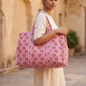 Embroidered Floral Quilted Cotton Tote Bag with comfortable shoulder handles showing the vibrant block print and detailed decorative stitching.