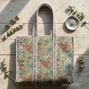 Floral Block Print Quilted Cotton Tote Bag in earthy tones with large shoulder handles showing the traditional botanical design.