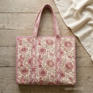Floral Handprinted Quilted Cotton Tote Bag with large shoulder handles showing the traditional multicolored botanical pattern.