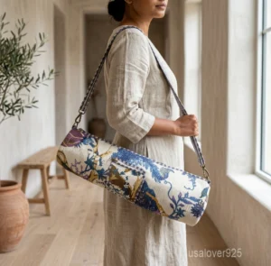 Floral Quilted Cotton Yoga Mat Bag with an adjustable shoulder strap showing the vibrant botanical print.