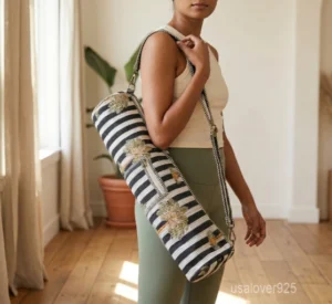 Floral Quilted Cotton Yoga Mat Bag with an adjustable shoulder strap showing the vibrant botanical print.