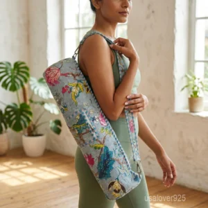 Floral Quilted Cotton Yoga Mat Bag with an adjustable shoulder strap showing the vibrant botanical print.