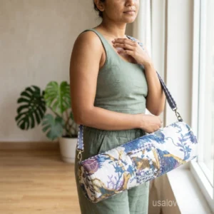 Floral Quilted Cotton Yoga Mat Bag with an adjustable shoulder strap showing the vibrant botanical print.