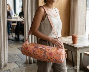 Floral Quilted Cotton Yoga Mat Bag with an adjustable shoulder strap showing the vibrant bohemian botanical print.