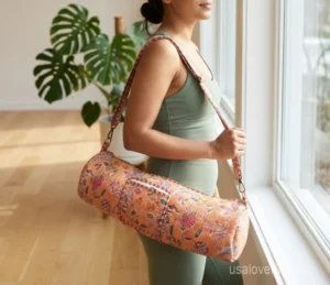 Floral Quilted Cotton Yoga Mat Bag with an adjustable shoulder strap showing the vibrant bohemian botanical print.