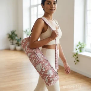 Woman walking to a studio carrying a Floral Quilted Yoga Mat Bag worn as a comfortable crossbody carrier.