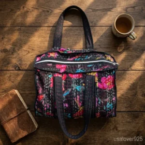 Woman carrying a Kantha Cotton Tote Bag filled with fresh flowers at a local bohemian market.