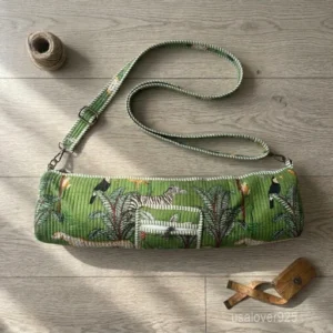 Forest Print Quilted Yoga Mat Bag carrier showing the traditional artisan tree and bird design with the full-length zipper closure and outer pocket.