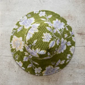Reversible side of the Green Block Print Quilted Cotton Bucket Hat showing solid color style.