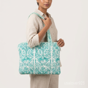 Green Botanical Quilted Cotton Laptop Sleeve tote showing the traditional hand block print artisan design with the top handles and magnetic snap closure.