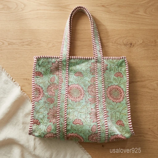 A person carrying a Green Floral Quilted Cotton Tote Bag comfortably over their shoulder during a casual outdoor market run.