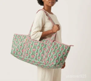 Green Floral Quilted Yoga Mat Bag showing the traditional hand block print artisan design with the spacious duffle-style opening and comfortable shoulder carry handles.