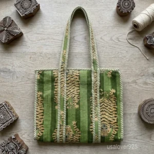 Green Striped Quilted Cotton Tote Bag with double handles showing the vertical lines and subtle beige artistic prints.