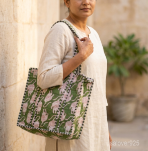 Green Tiger Quilted Tote Bag showing the traditional artisan jungle print design with the spacious main compartment opening and reinforced shoulder straps.