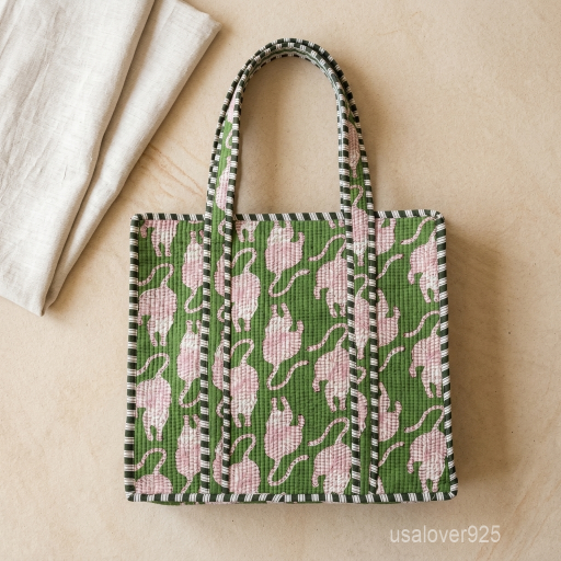 A shopper carrying the Green Tiger Quilted Tote Bag by the wide straps, showcasing its generous packing capacity and vibrant bohemian accessory style at a farmers market.