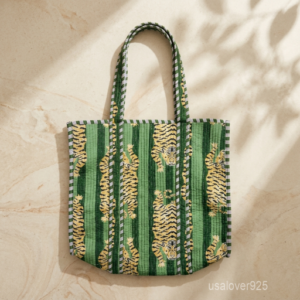 Green Tiger Quilted Tote Bag showing the traditional artisan jungle print design with the spacious main compartment opening and reinforced shoulder straps.
