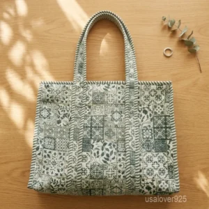 Green and White Patchwork Quilted Cotton Tote Bag with padded shoulder straps showing the floral and geometric block print layout.