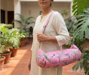 Hand Block Print Pink Yoga Mat Bag carrier showing the traditional artisan crane print design with the full-length zipper closure and outer pocket.