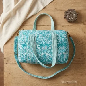Green Floral Quilted Cotton Weekender Bag showing the traditional hand block print artisan design with the full-length zipper closure and comfortable shoulder straps.