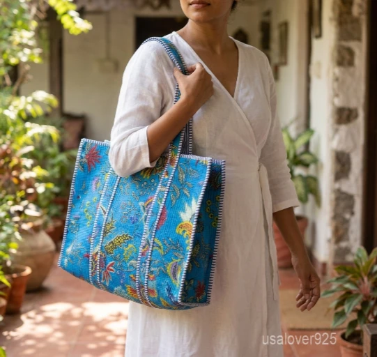Handmade Block Print Quilted Indian Cotton Tote Bag with large travel shoulder straps showing the traditional hand block botanical pattern.