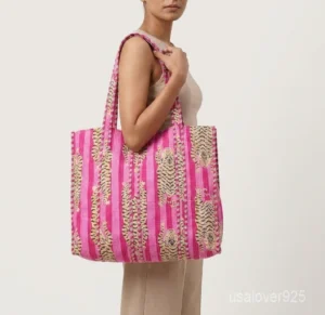Pink Tiger Quilted Cotton Tote Bag showing the traditional hand block print artisan design with the spacious main compartment opening and reinforced double shoulder handles.