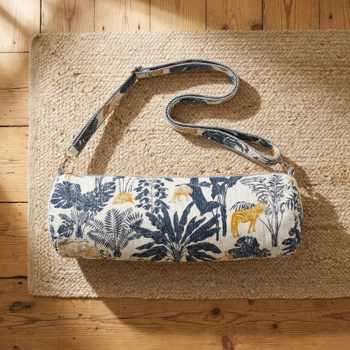 Indigo Gold Tiger Quilted Yoga Mat Bag showing the traditional hand block print artisan design with the full-length zipper closure, outer zip pocket, and adjustable shoulder strap.