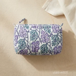 Set of 3 Quilted Block Print Toiletry Bags nesting set showing the traditional multicolor design and secure zipper lines with accent beads and tassels.