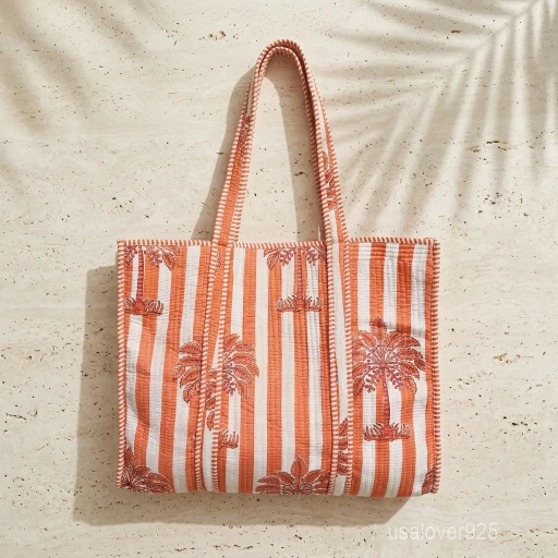 Orange Quilted Cotton Tote Bag with large shoulder handles showing the vibrant traditional handprinted artisan design.