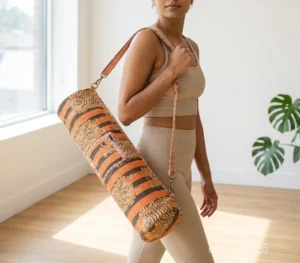 Orange Tiger Quilted Cotton Yoga Mat Bag with an adjustable shoulder strap showing the bold animal print pattern.