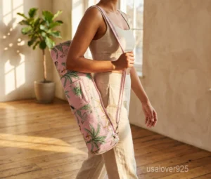 Pink Floral Quilted Cotton Yoga Mat Bag with an adjustable shoulder strap showing the vibrant botanical print.