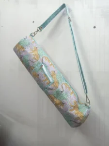 Pink Leopard Print Quilted Cotton Yoga Mat Bag with an adjustable shoulder strap showing the vibrant animal motif.
