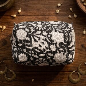 Close-up of the largest case in the Quilted Cotton Cosmetic Bag Set opened to reveal the clean waterproof plastic inner lining, smooth zipper track, and protective horizontal stitching texture.