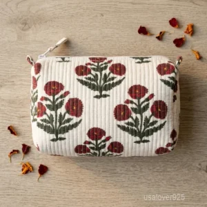 Quilted Cotton Makeup Pouch showing the traditional block print artisan design and secure zipper closure.