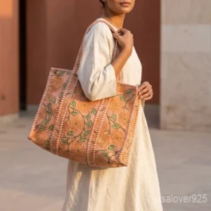 Quilted Floral Block Print Cotton Tote Bag with striped handles showing the traditional hand block botanical print layout in warm earthy tones.