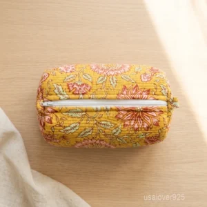 Set of 3 Quilted Floral Toiletry Bag Set nesting configuration showing the traditional block print artisan design and secure zipper fastenings.