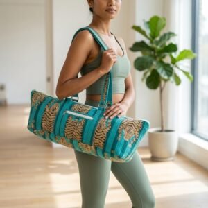 Close-up of the handcrafted wild cat stripe print detailing, dense quilted stitching texture lines, robust handle strap attachments, and spacious open layout on an Indian cotton Pilates carrier bag.