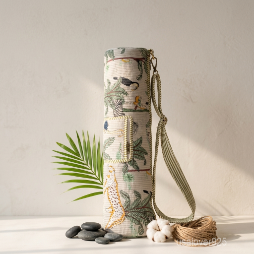Woman walking to a fitness class carrying a Tropical Animal Print Quilted Cotton Yoga Mat Bag comfortably as a crossbody sling.