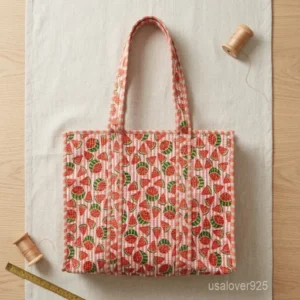 Watermelon Print Kantha Stitch Quilted Cotton Tote Bag with comfortable shoulder handles showing the bright pink and green fruit pattern design.
