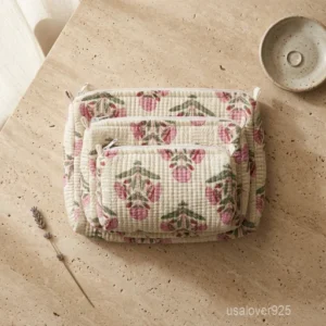 Set of 3 White Block Print Quilted Cotton Toiletry Bags nesting set showing the traditional monochrome design and secure zipper lines with accent beads and tassels.